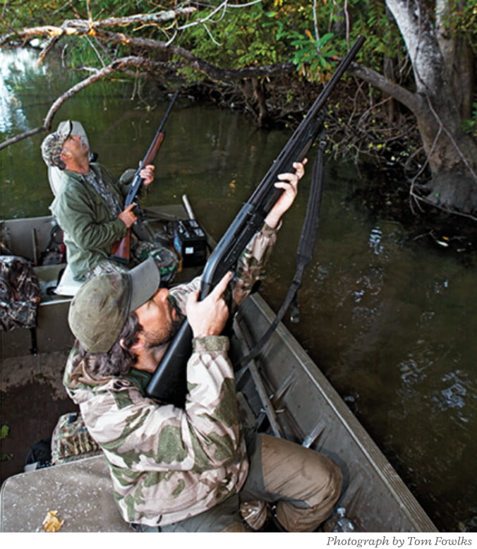 Woodduck and client squirrel hunting