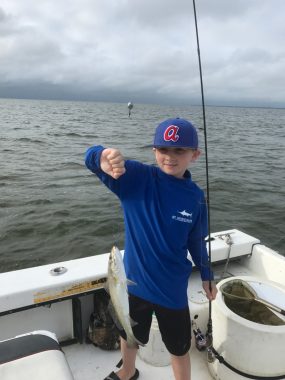 St George Island Fishing Charters - Child with his first catch