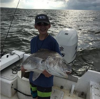 Happy-kid-charter-fishing-on-St-George-Island